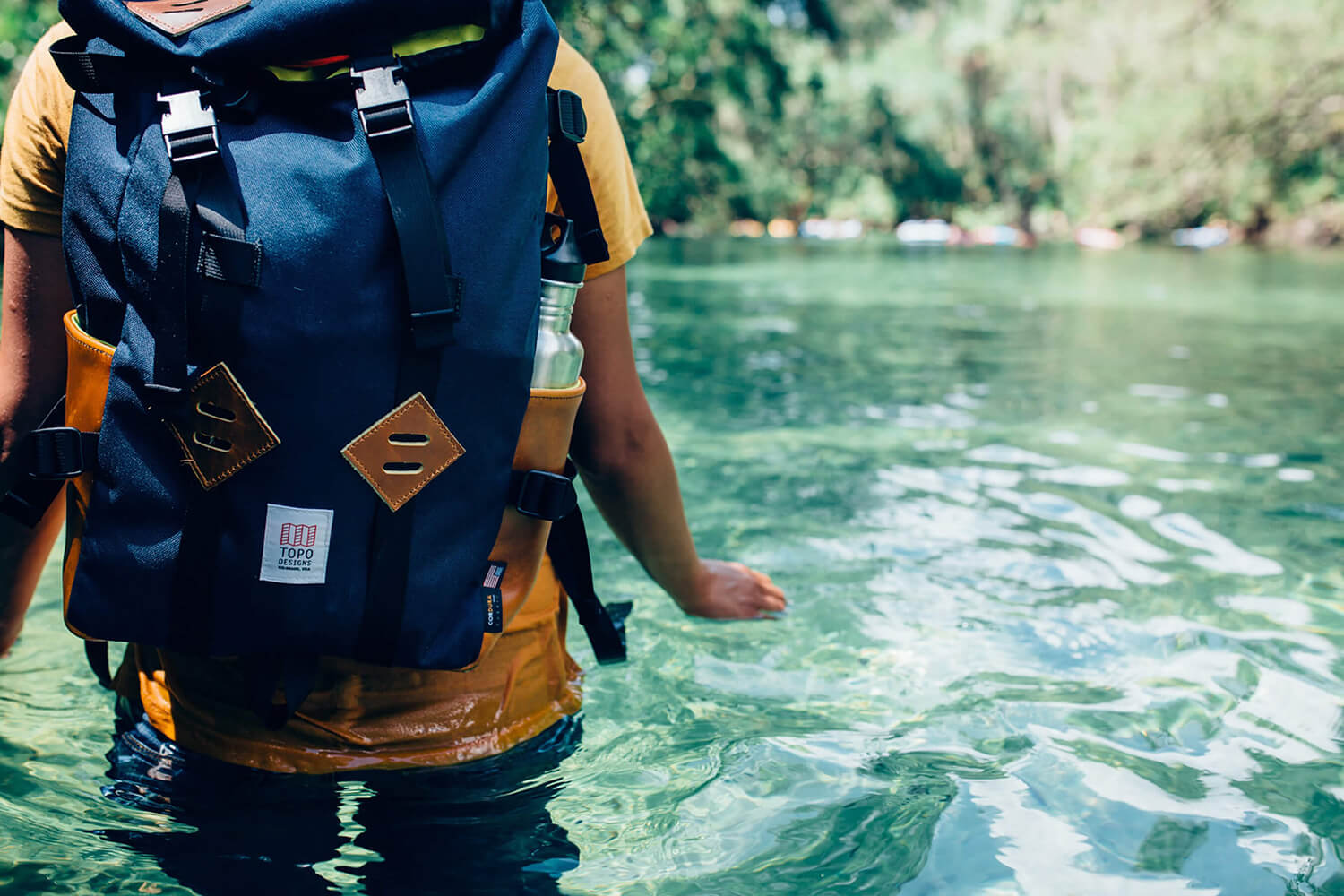 Demo photo of a backpacker in the water
